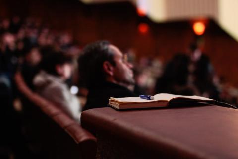 A Notebook in an Auditorium