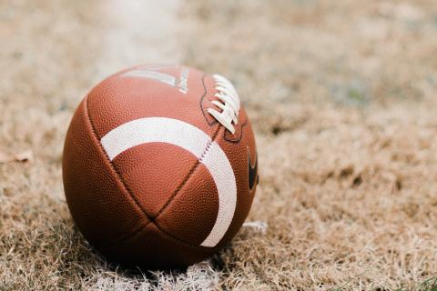 A football in the grass